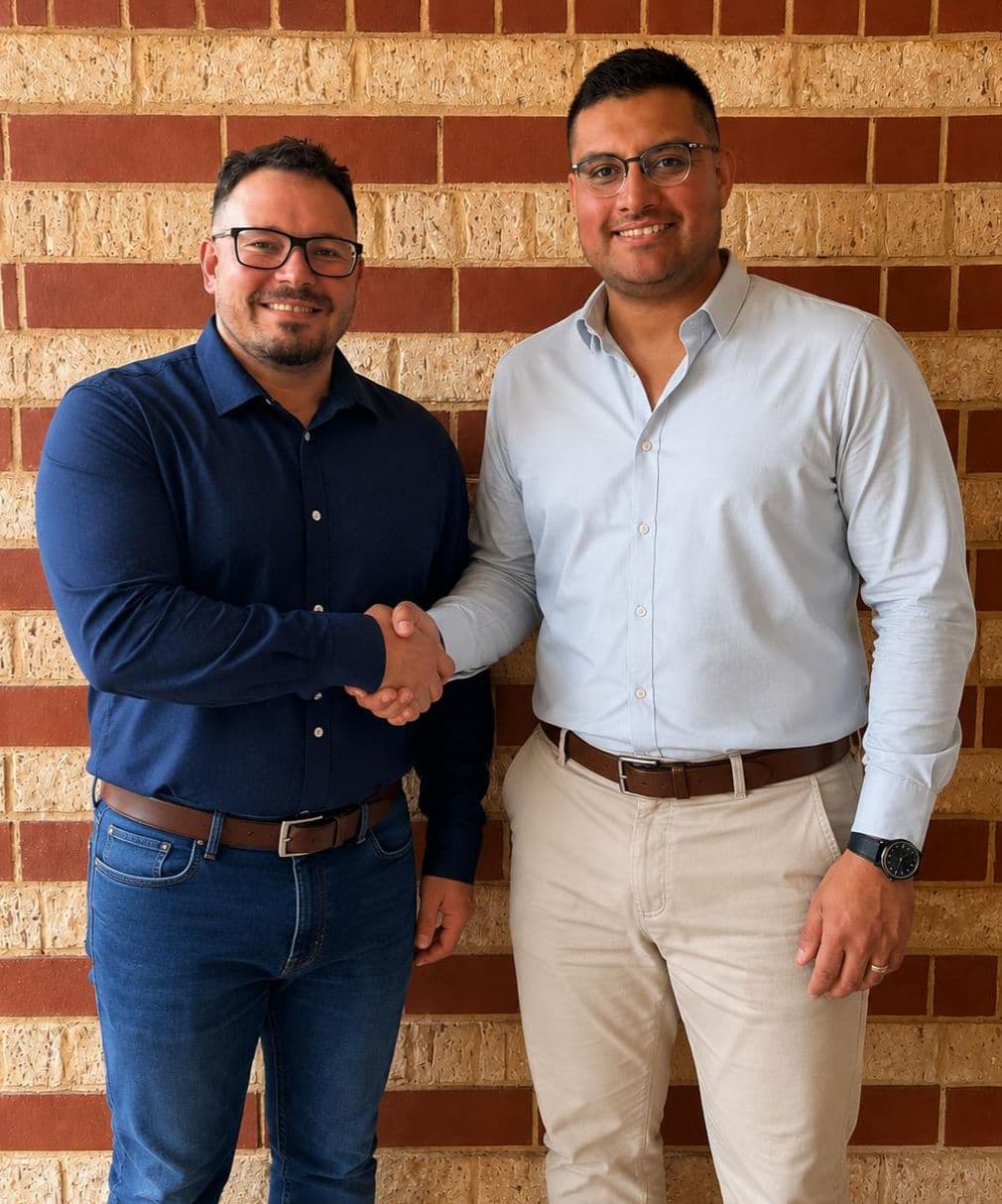 Fernando and Julian, the founders of CXUP, shaking hands in Perth